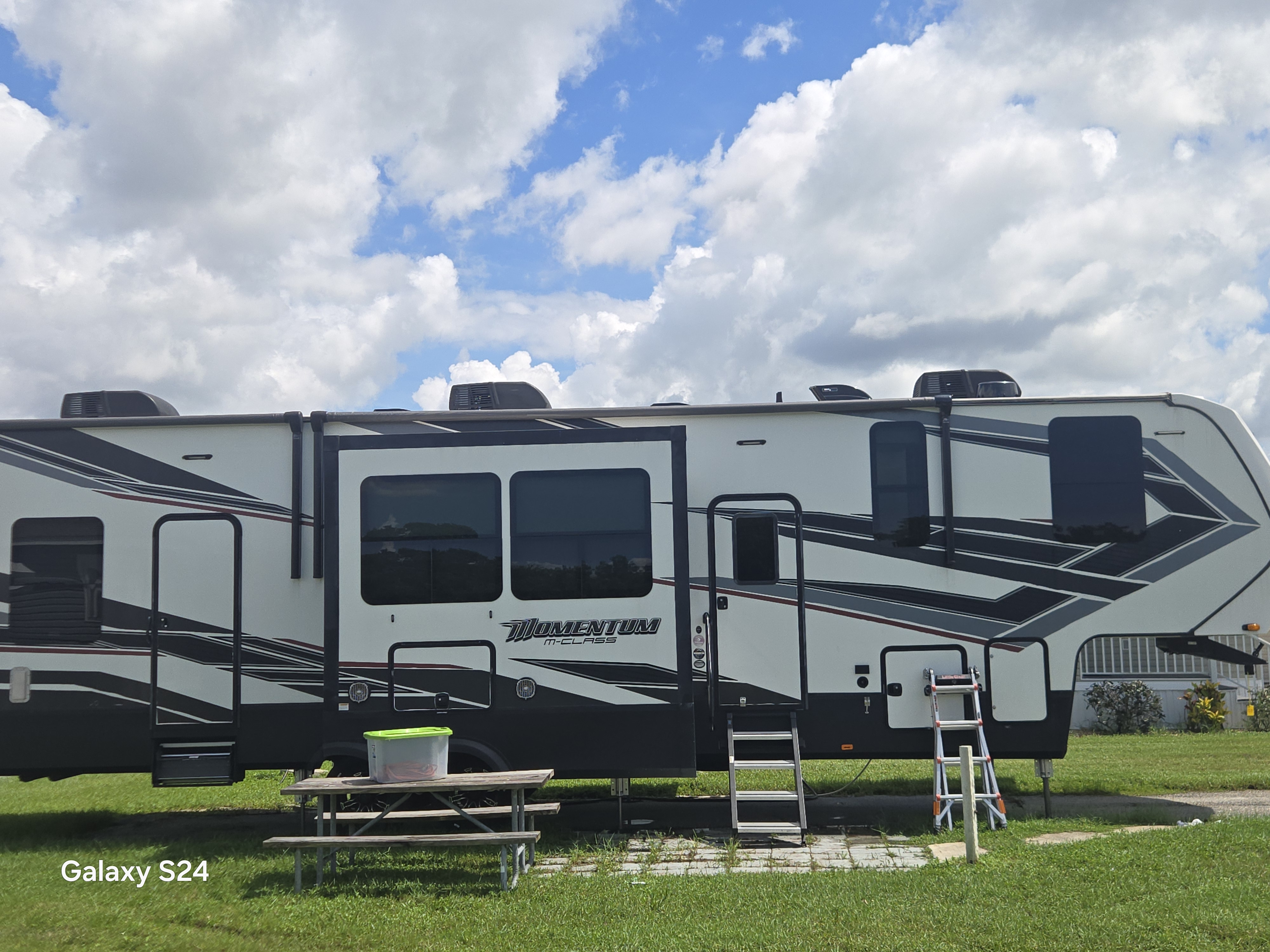 Momentum M-Class RV serviced at a campsite by Rudy's RV Repair in Sarasota, Florida