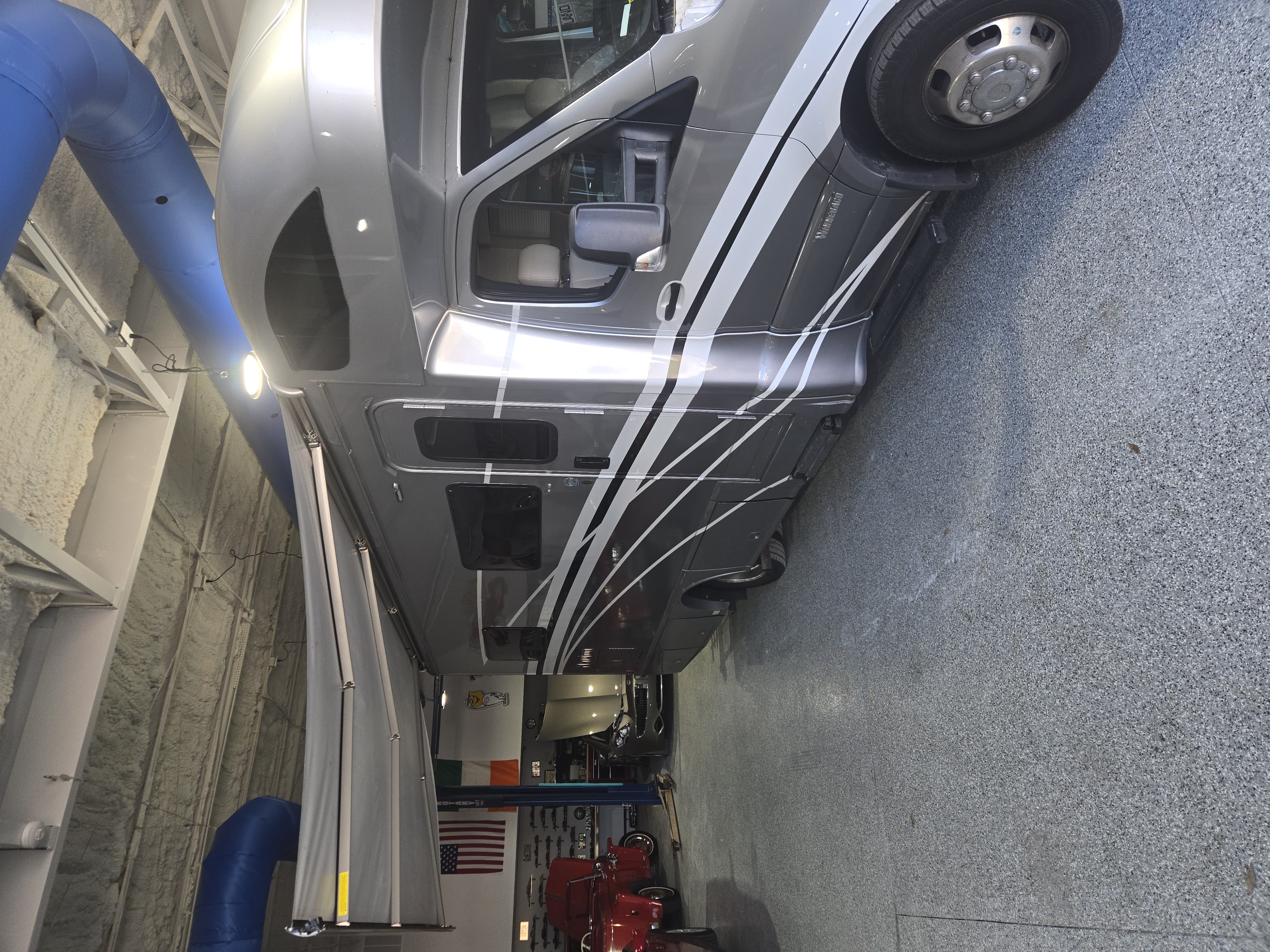 RV raised for service while gas and electric appliance work is carried out in Sarasota, FL